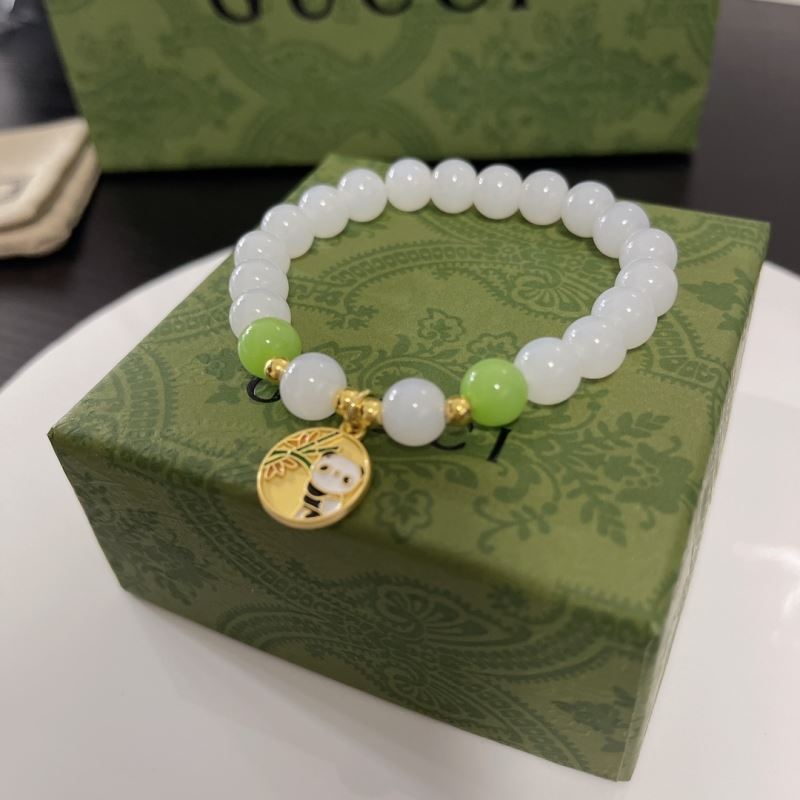 G*u*i bracelets